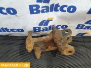 Кронштейн амортизатора левый